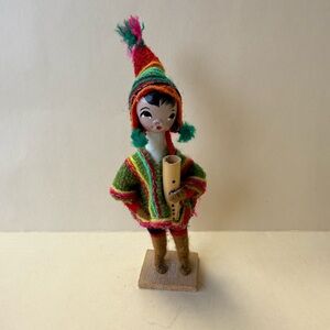 Vintage Peruvian Folk Art Flute Player Figurine with Vibrant Dress.